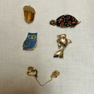 assorted vintage pins
